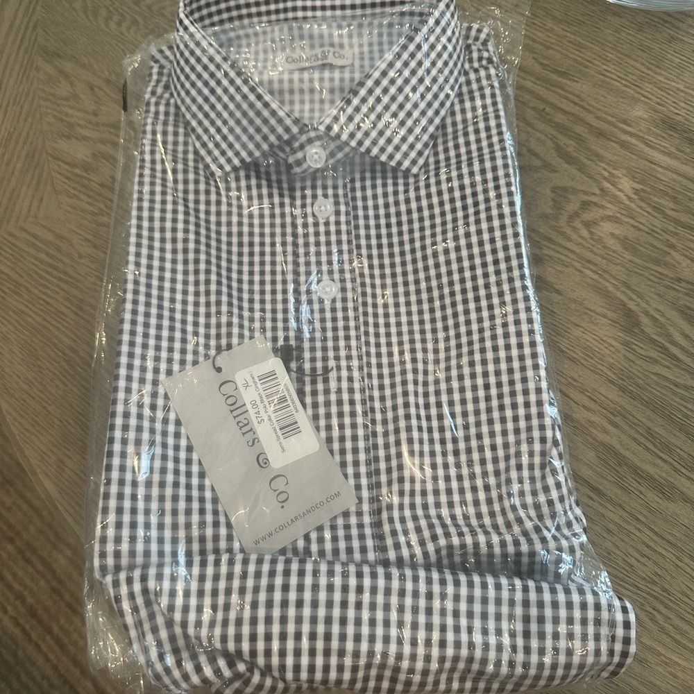 Brand new collarded long sleeve still in plastic